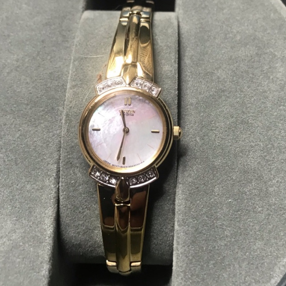 Citizens eco drive ladies watch with 12 diamonds and mother of pearl face